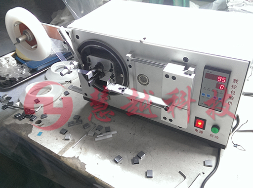 自動(dòng)包膠機(jī)實(shí)物圖 自動(dòng)包膠機(jī)實(shí)物圖